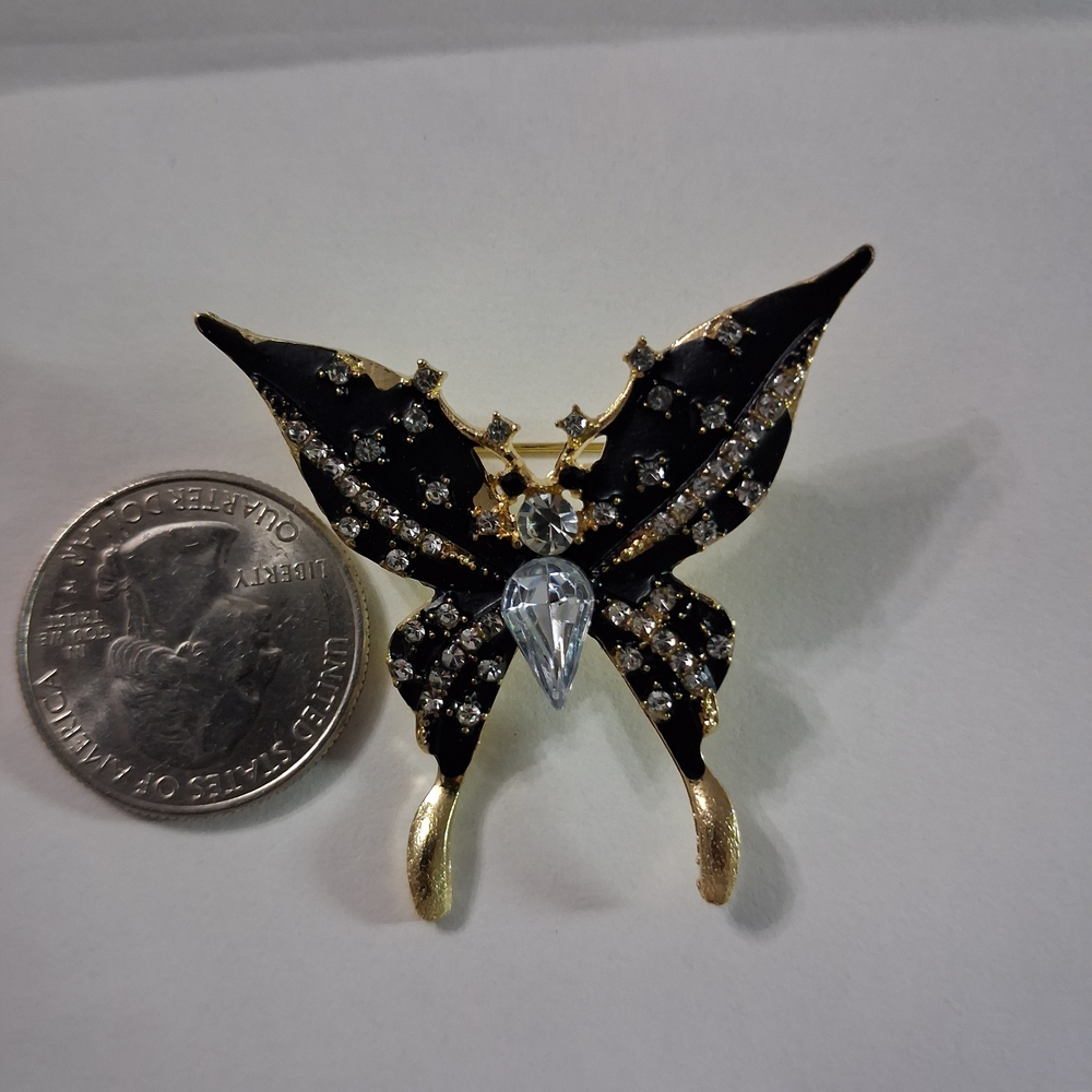 Source Unknown Black and Gold Butterfly Brooch